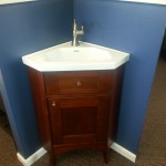 Corner sinks will open up unused space in your new bathroom.