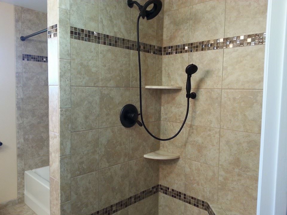 https://www.aloneeagle.com/wp-content/uploads/2016/01/Tile-Shower-with-granite-cornershelves.jpg