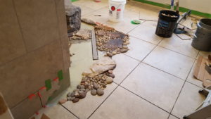 Laticrete Linear drain installation in tiled shower