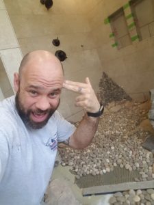 installing pebbles in a Harrisburg, Pa bathroom