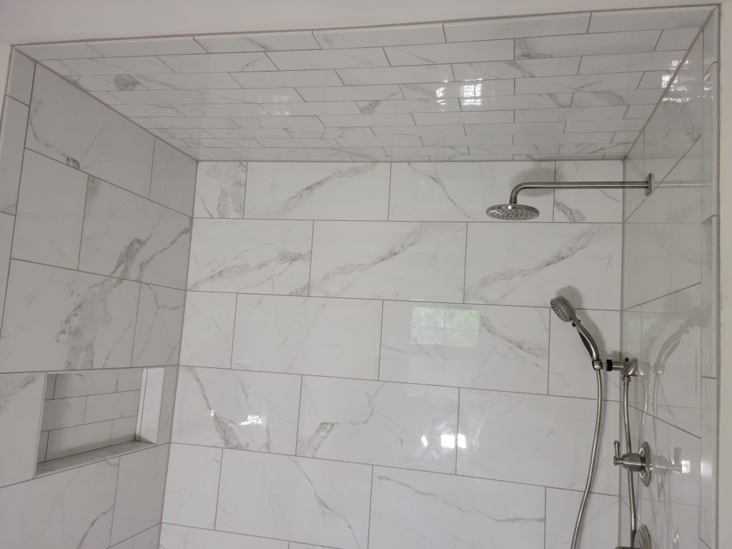 Tiled shower in Camp Hill, Pa with niche and tile ceiling.