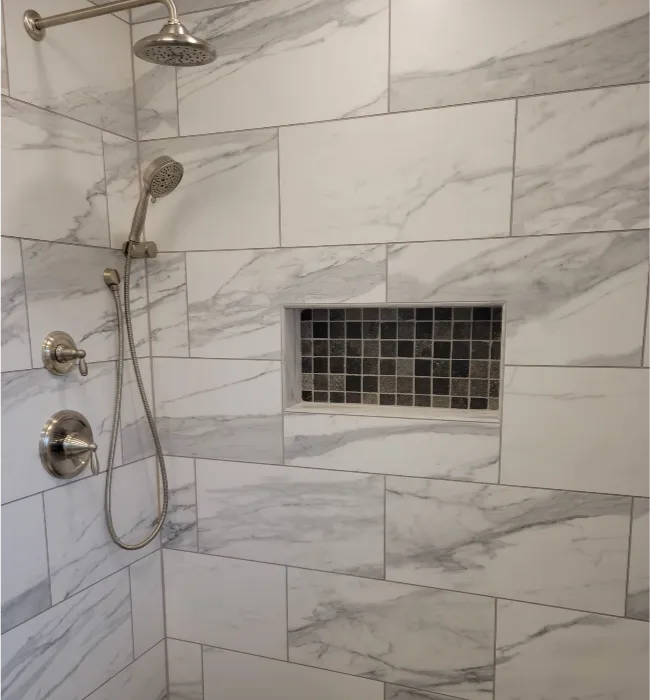 replacing an older shower with a new tile shower